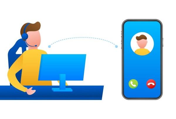 Customer Service Agent Making a Call from Computer to Smartphone